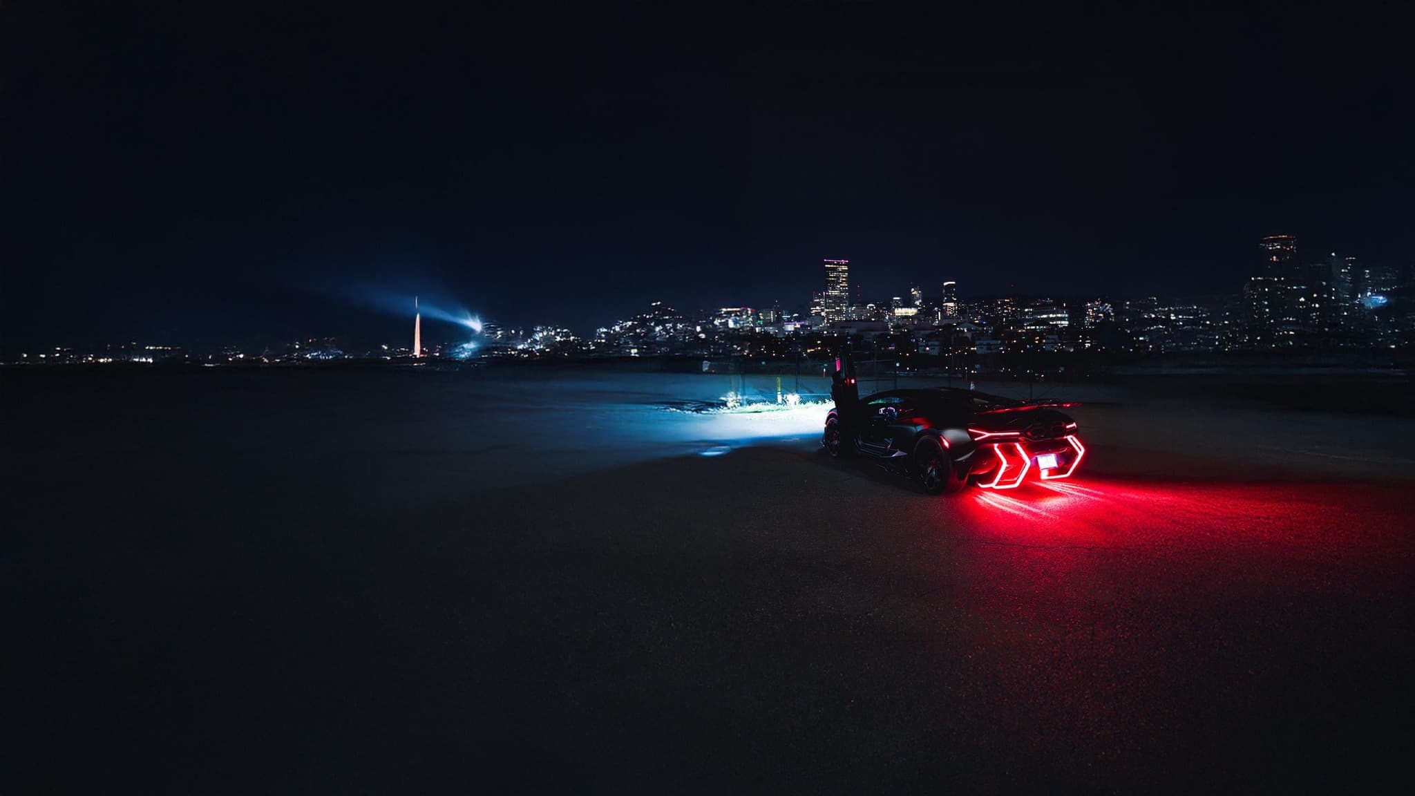 Teem Chase gold Lamborghini at night
